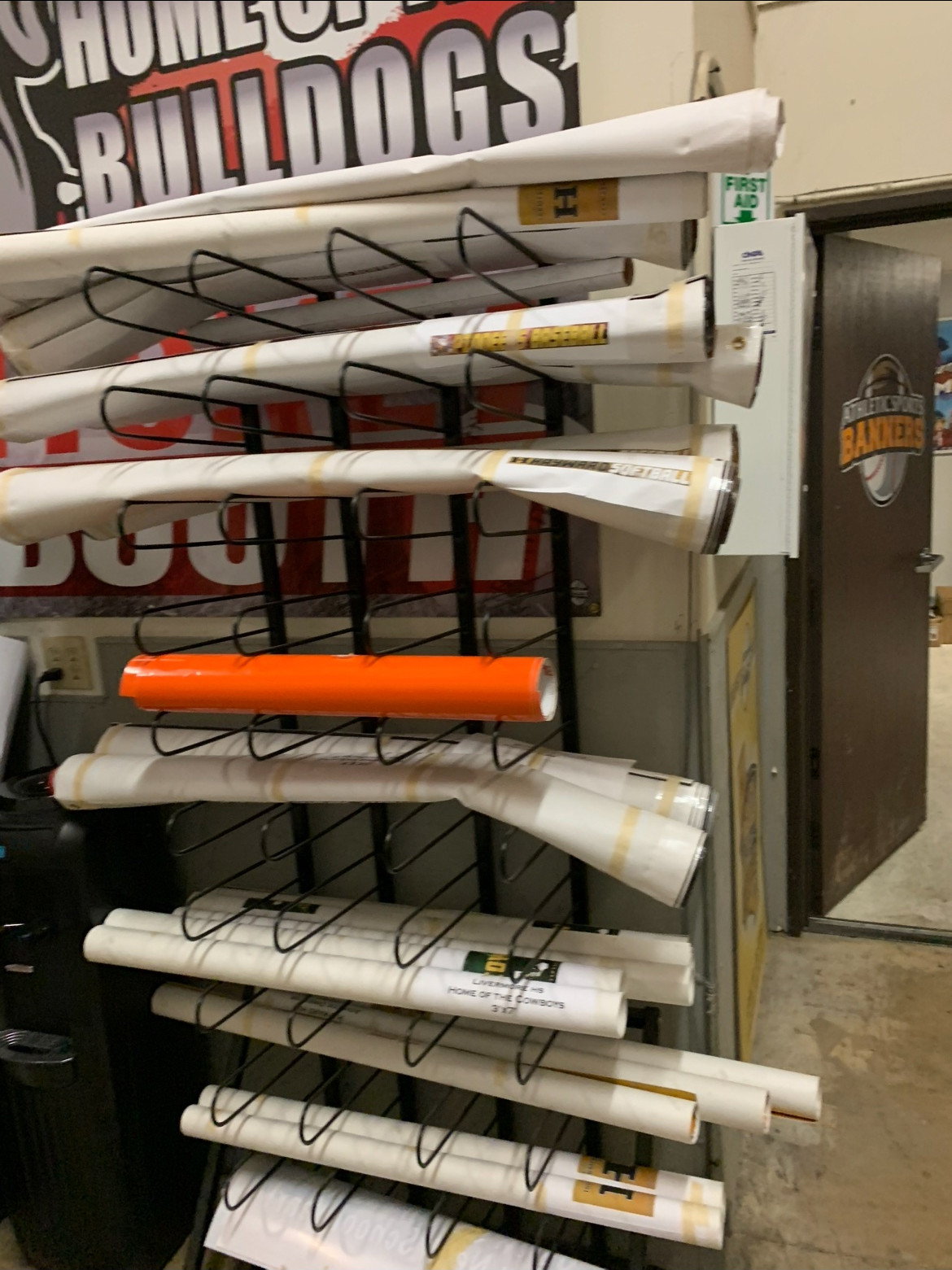 Banner roll storage rack in the shop